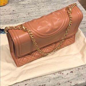 Dusty pink and gold Tory Burch cross body